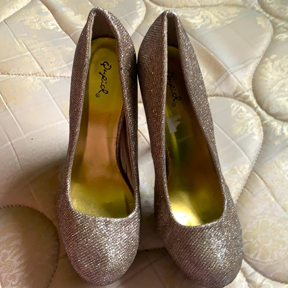 Shiny gold heels